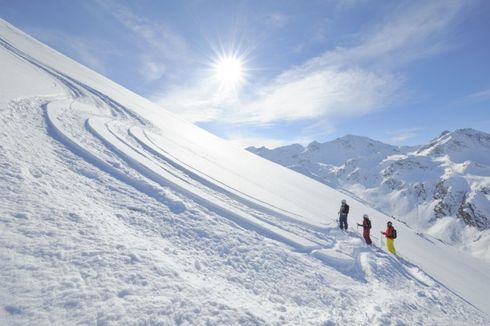 Skipiste mit Sonne