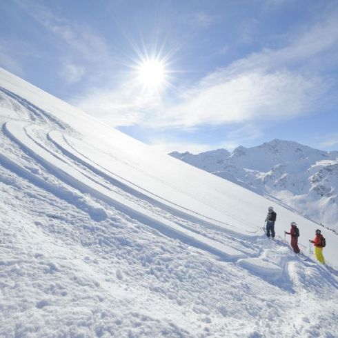 Skipiste mit Sonne